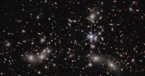 Matéria visível de aglomerados de galáxias concentra emissões mais potentes de raios gama